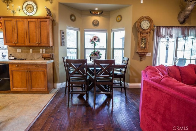 dining area with wood-type flooring