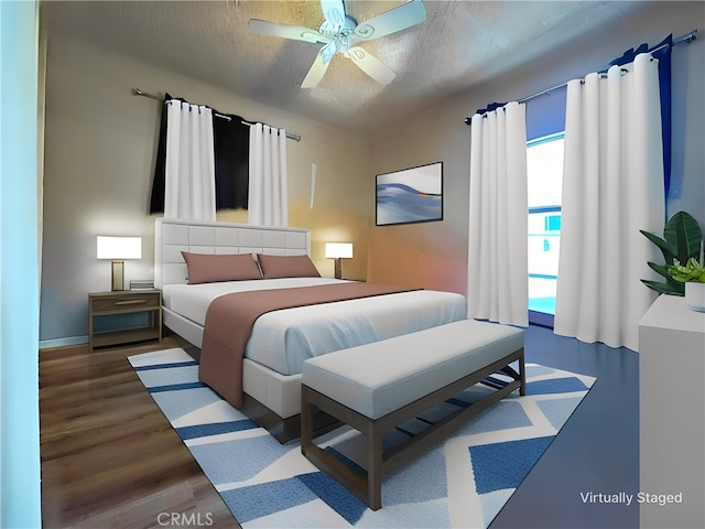 bedroom with ceiling fan, a textured ceiling, and hardwood / wood-style flooring