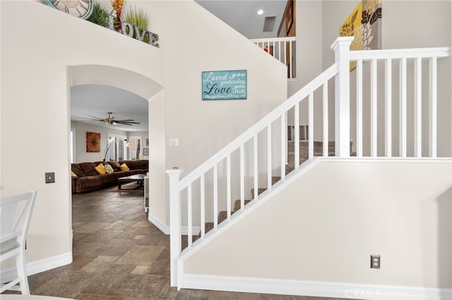 staircase with ceiling fan