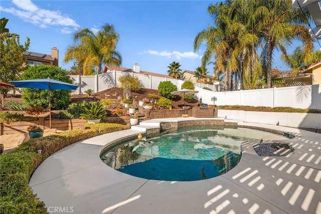 view of pool featuring a patio area