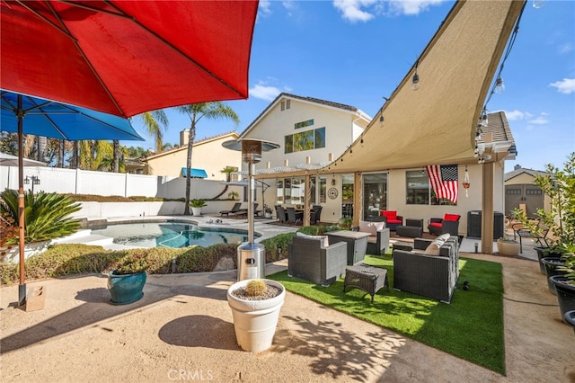 view of patio / terrace featuring a fenced in pool and outdoor lounge area