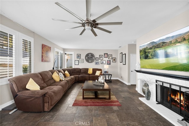 living room featuring ceiling fan