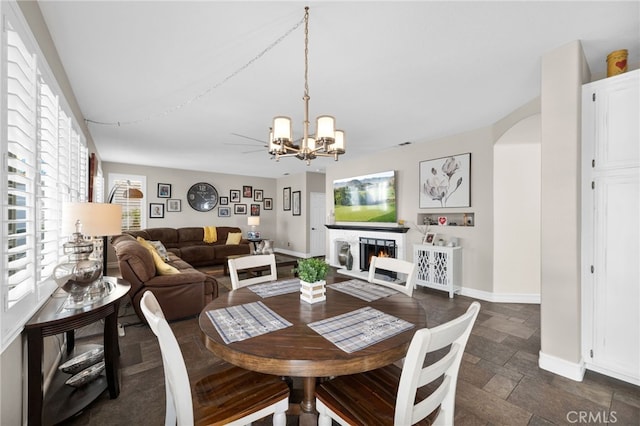 dining area with a notable chandelier