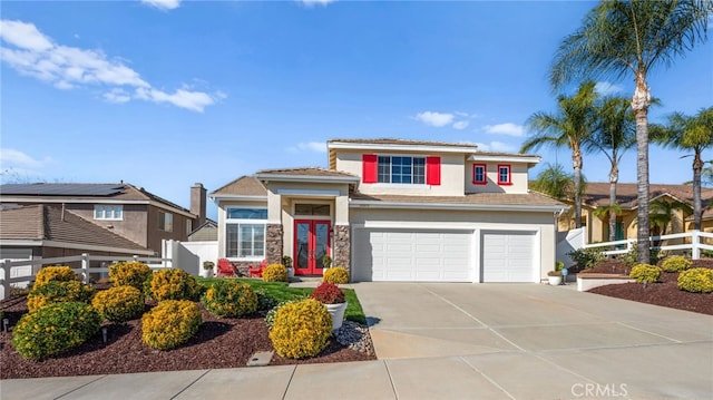 view of front of house with a garage