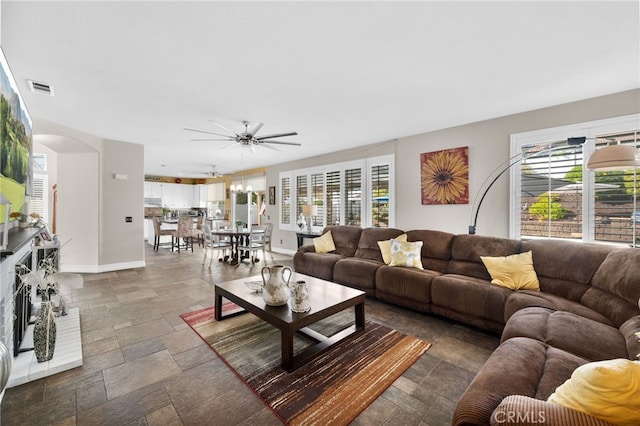 living room with ceiling fan