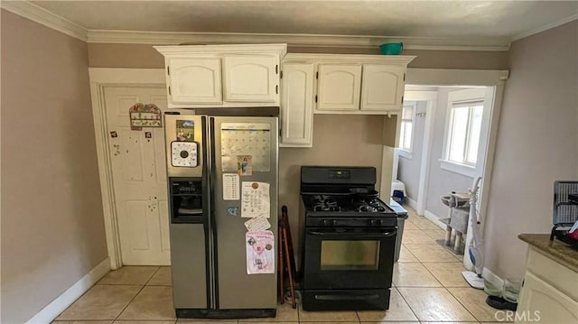 kitchen featuring white cabinets, stainless steel fridge, ornamental molding, black gas range oven, and light tile patterned flooring