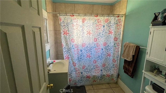 full bathroom featuring tile patterned floors, vanity, shower / bath combo, and toilet