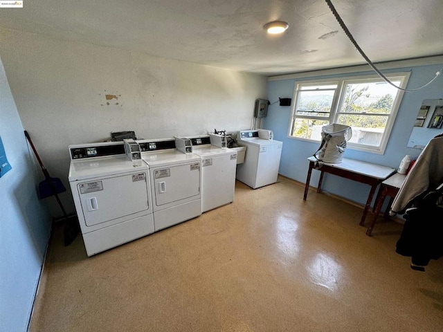 washroom featuring independent washer and dryer