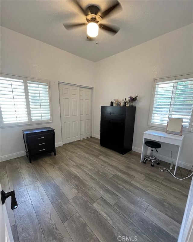 home office featuring hardwood / wood-style flooring and ceiling fan