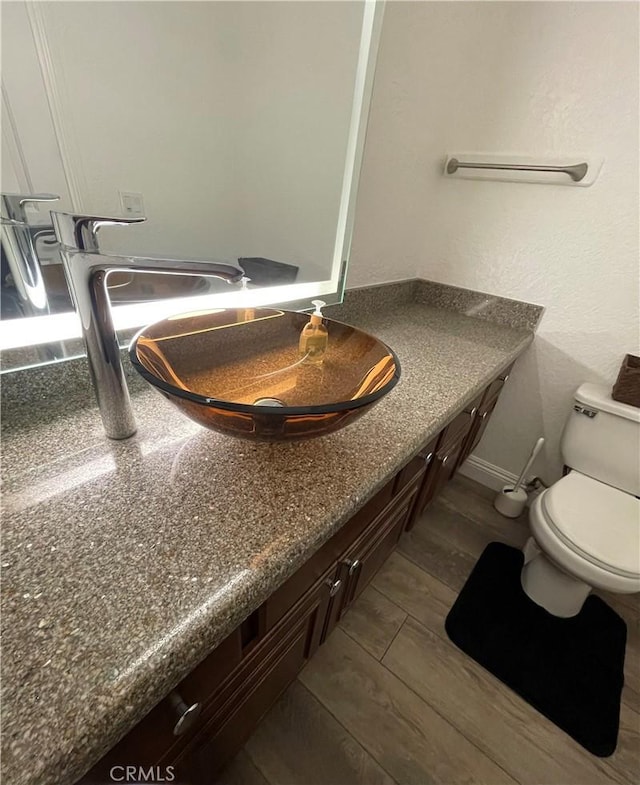 bathroom with toilet and sink