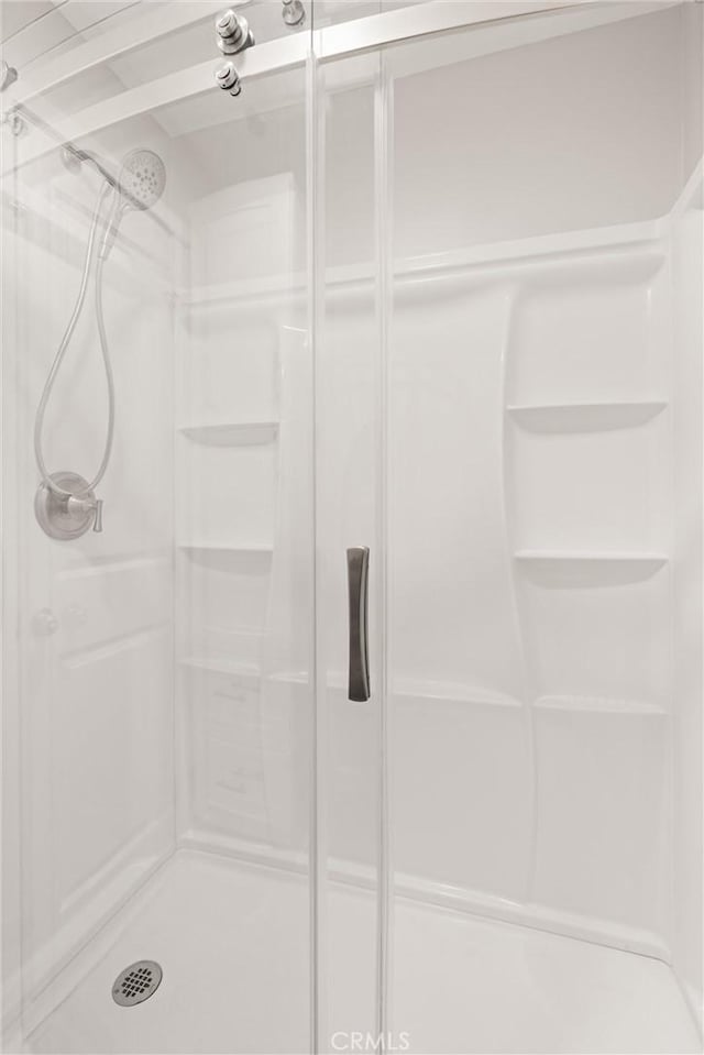 bathroom with a stall shower