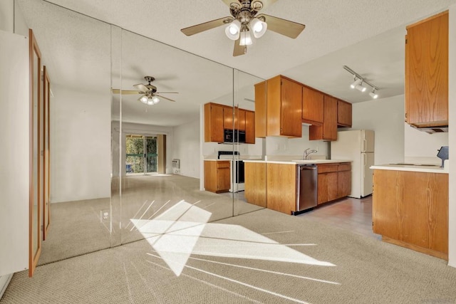 kitchen with light carpet, stove, ceiling fan, white refrigerator, and stainless steel dishwasher