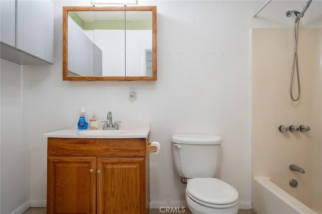 full bathroom featuring vanity, bathing tub / shower combination, and toilet