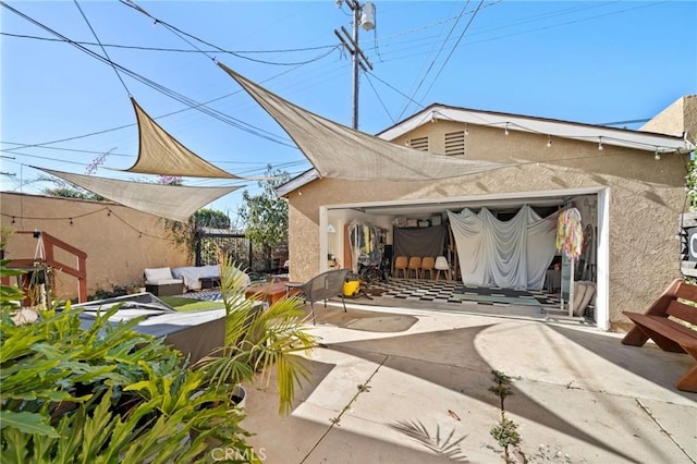 exterior space featuring an outdoor hangout area