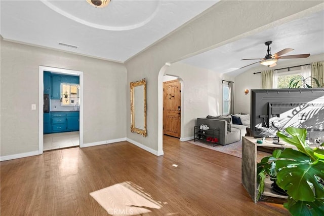 interior space featuring hardwood / wood-style floors and ceiling fan