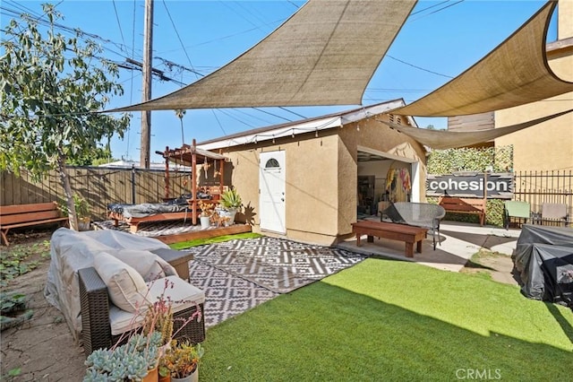 view of yard with an outbuilding and a patio area