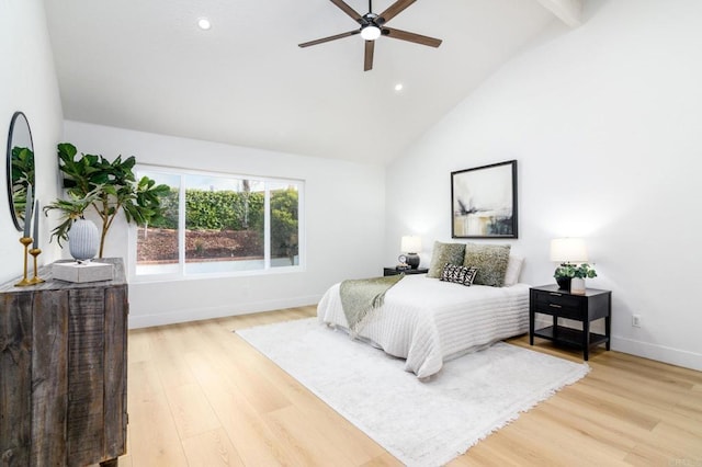 bedroom featuring beam ceiling, ceiling fan, light hardwood / wood-style flooring, and high vaulted ceiling