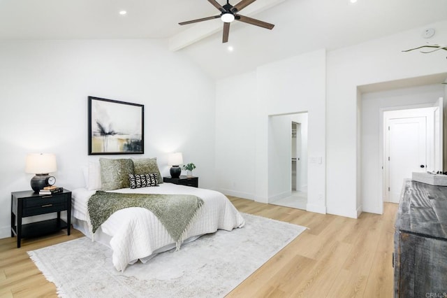 bedroom with beamed ceiling, ceiling fan, hardwood / wood-style floors, and high vaulted ceiling