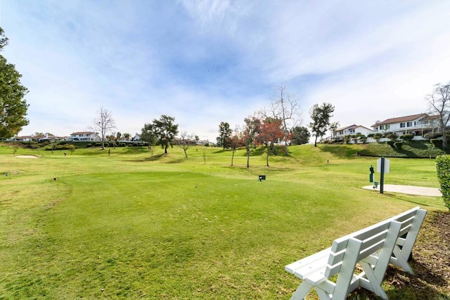 view of community featuring a yard