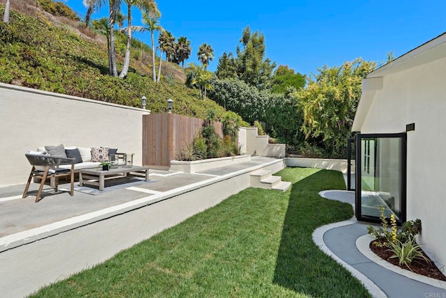 view of yard featuring a patio area and an outdoor hangout area