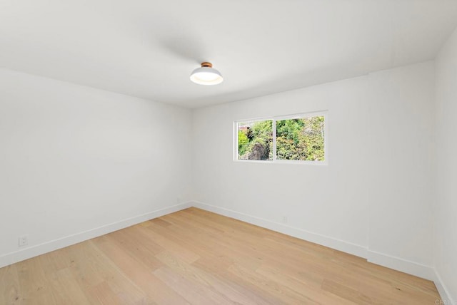 empty room with light wood-type flooring