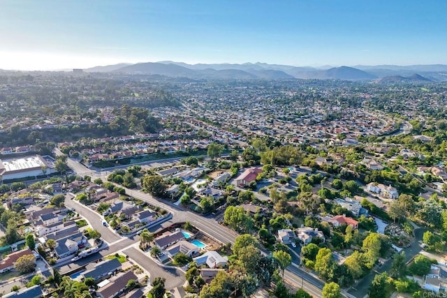 birds eye view of property with a mountain view