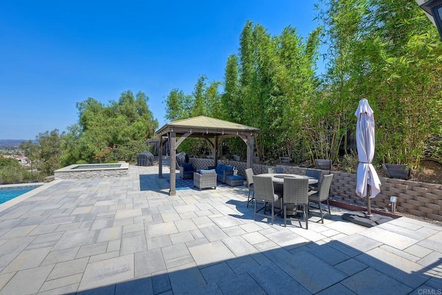 view of patio / terrace with a gazebo and outdoor lounge area