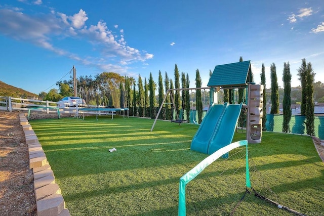 view of jungle gym with a yard