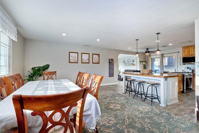 dining space featuring hardwood / wood-style flooring