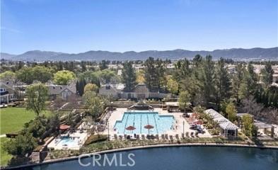 bird's eye view with a water and mountain view