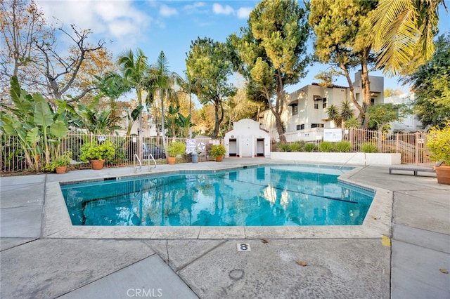 view of pool featuring a patio