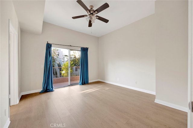 empty room featuring light hardwood / wood-style floors and ceiling fan