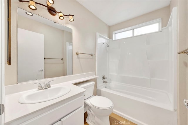 full bathroom with shower / tub combination, vanity, and toilet