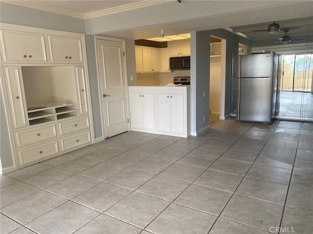 kitchen featuring ceiling fan, light tile patterned floors, ornamental molding, and appliances with stainless steel finishes