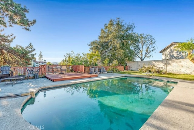 view of pool featuring a deck