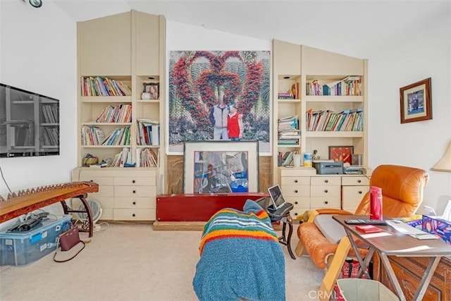 living area with light carpet and vaulted ceiling