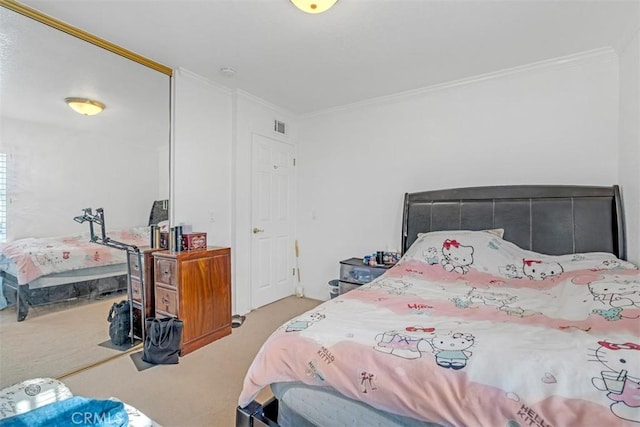 carpeted bedroom with crown molding