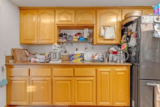 kitchen with stainless steel refrigerator