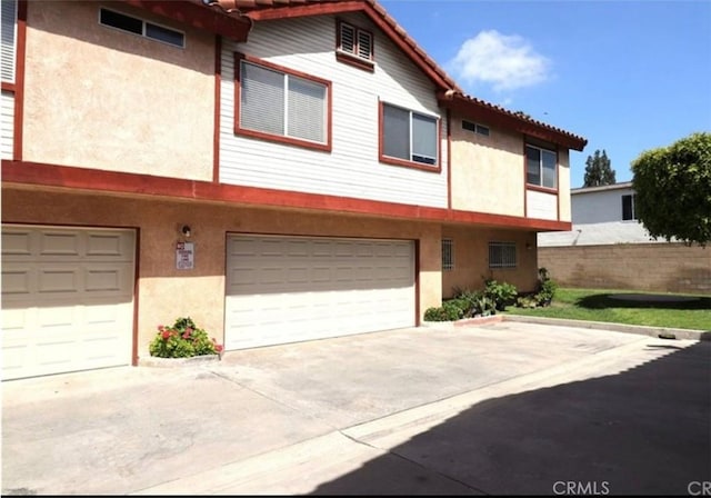 view of property featuring a garage