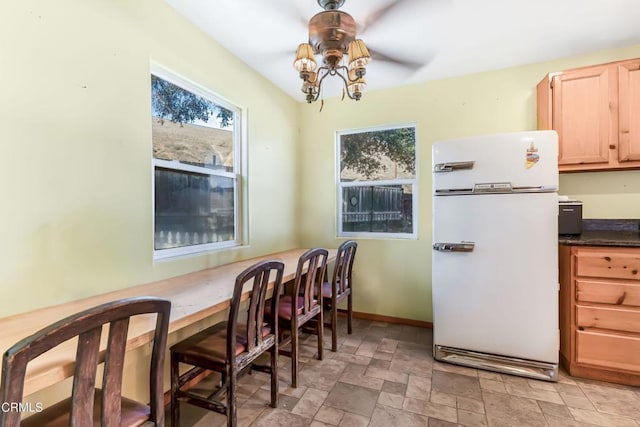 dining space with ceiling fan