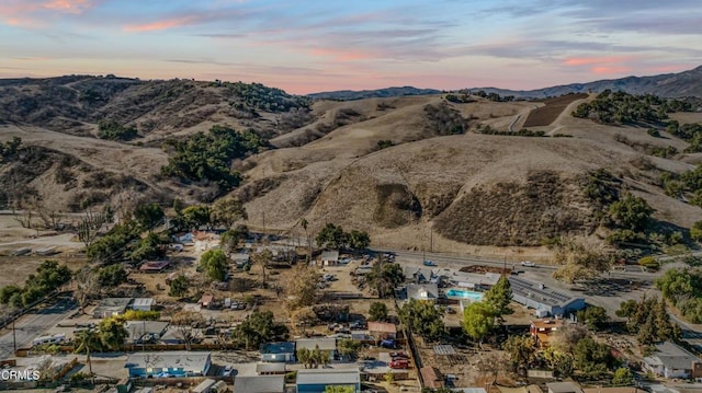 aerial view at dusk with a mountain view