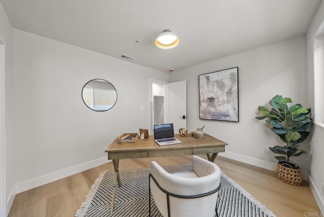 office area featuring light hardwood / wood-style floors