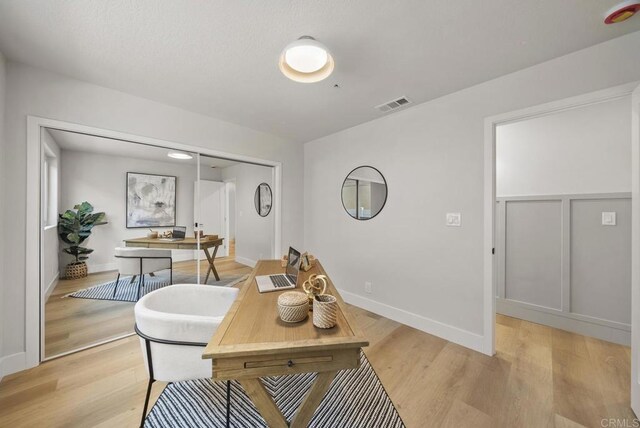 office featuring light hardwood / wood-style floors