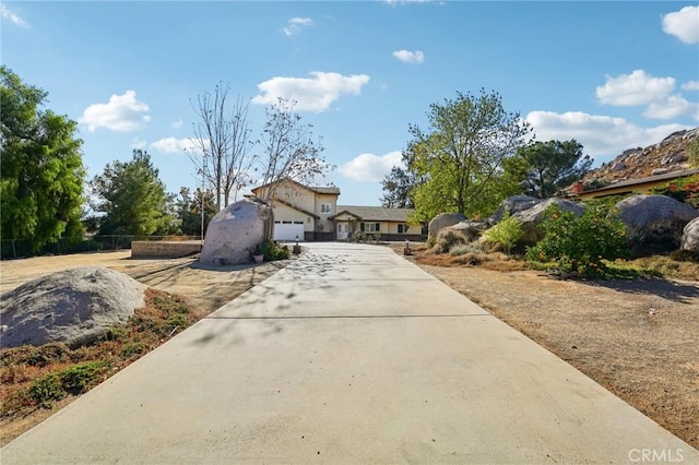 mediterranean / spanish-style home featuring a garage