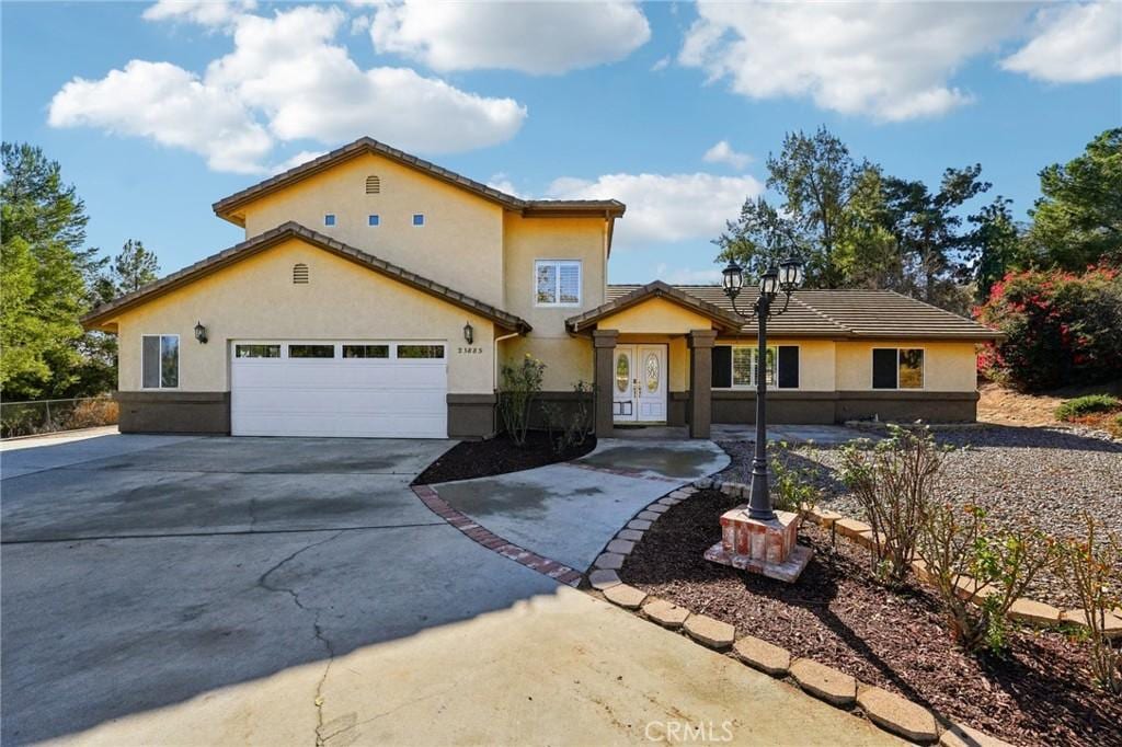 view of front of house with a garage