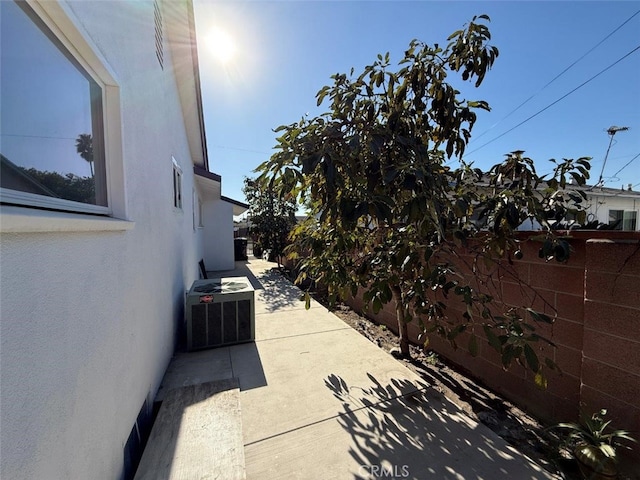 view of patio with central AC unit