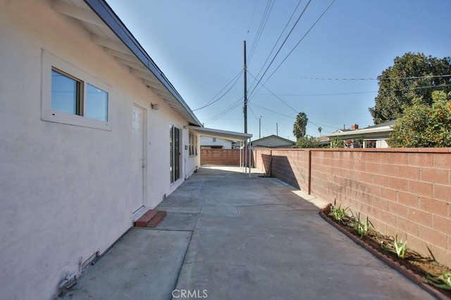 view of home's exterior with a patio