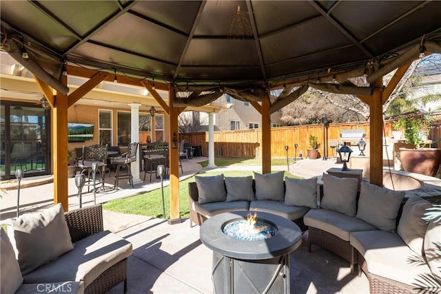 view of patio / terrace featuring a gazebo and an outdoor hangout area