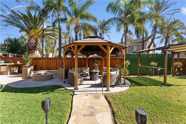 view of patio / terrace featuring a gazebo, grilling area, and an outdoor living space with a fire pit