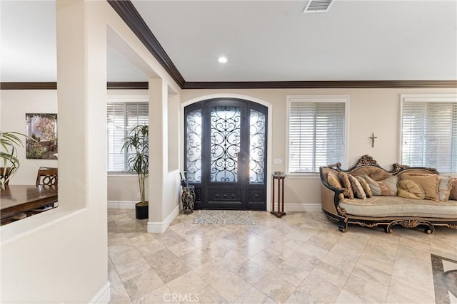 entrance foyer with crown molding